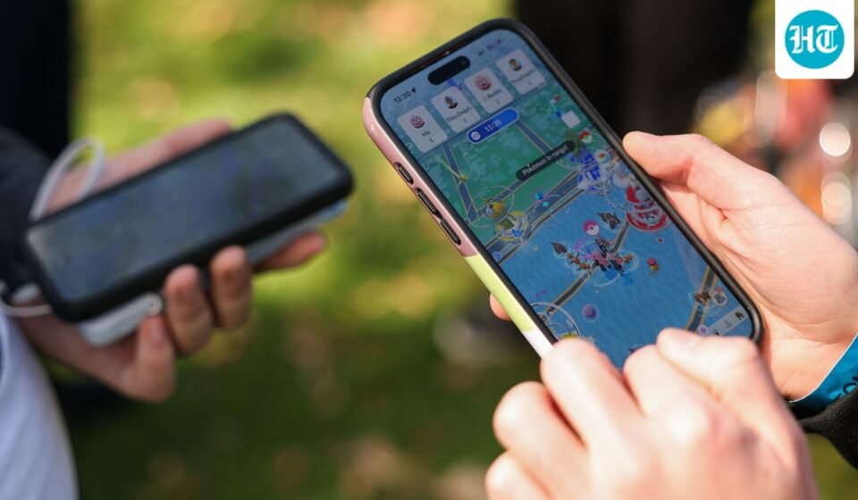 People play the Pokemon GO game on smartphones during the in-person Pokemon GO Tour. (AFP/ File Photo)