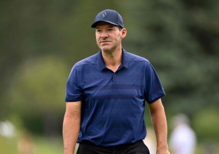 After being placed on leave indefinitely by CBS Sports, Tony Romo discusses personal challenges, including a DUI. (Getty Images via AFP)