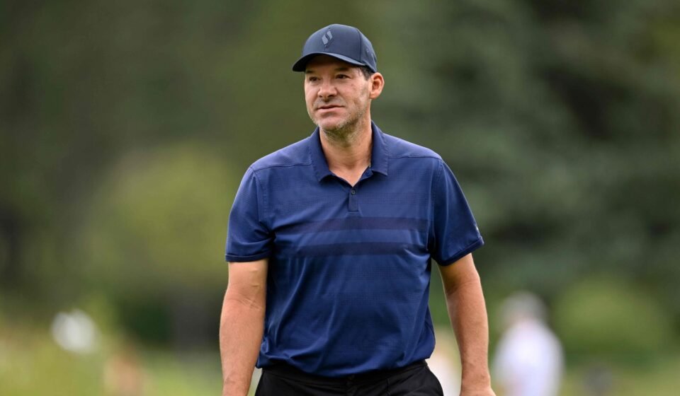 After being placed on leave indefinitely by CBS Sports, Tony Romo discusses personal challenges, including a DUI. (Getty Images via AFP)