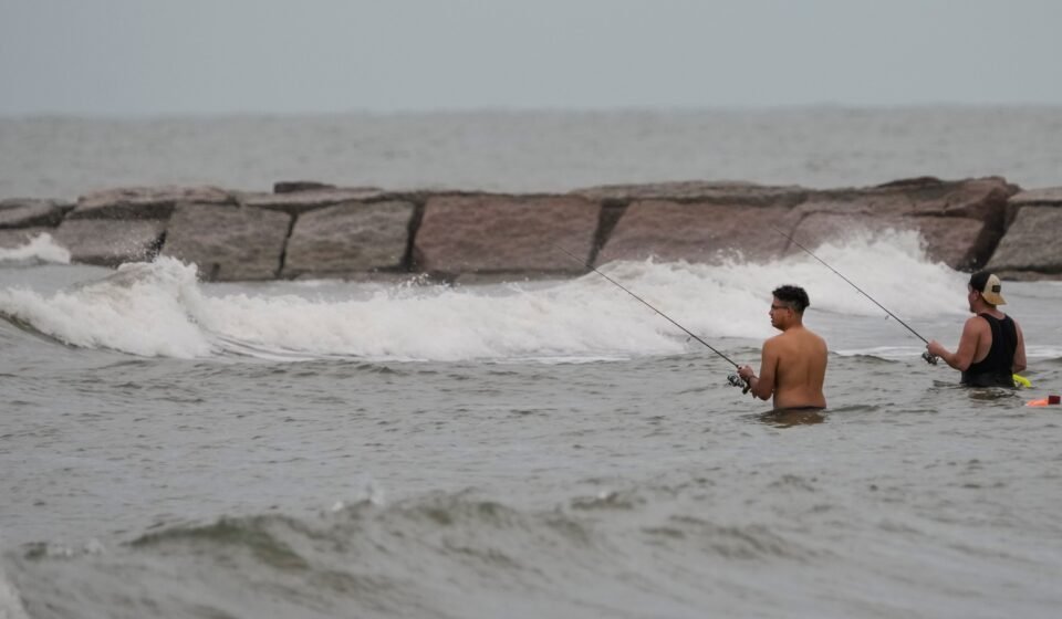 The National Hurricane Center reported that Edouard was located about 15 miles (25 kilometers) south-southeast of Port Arthur, Texas. (Brett Coomer/Houston Chronicle v)