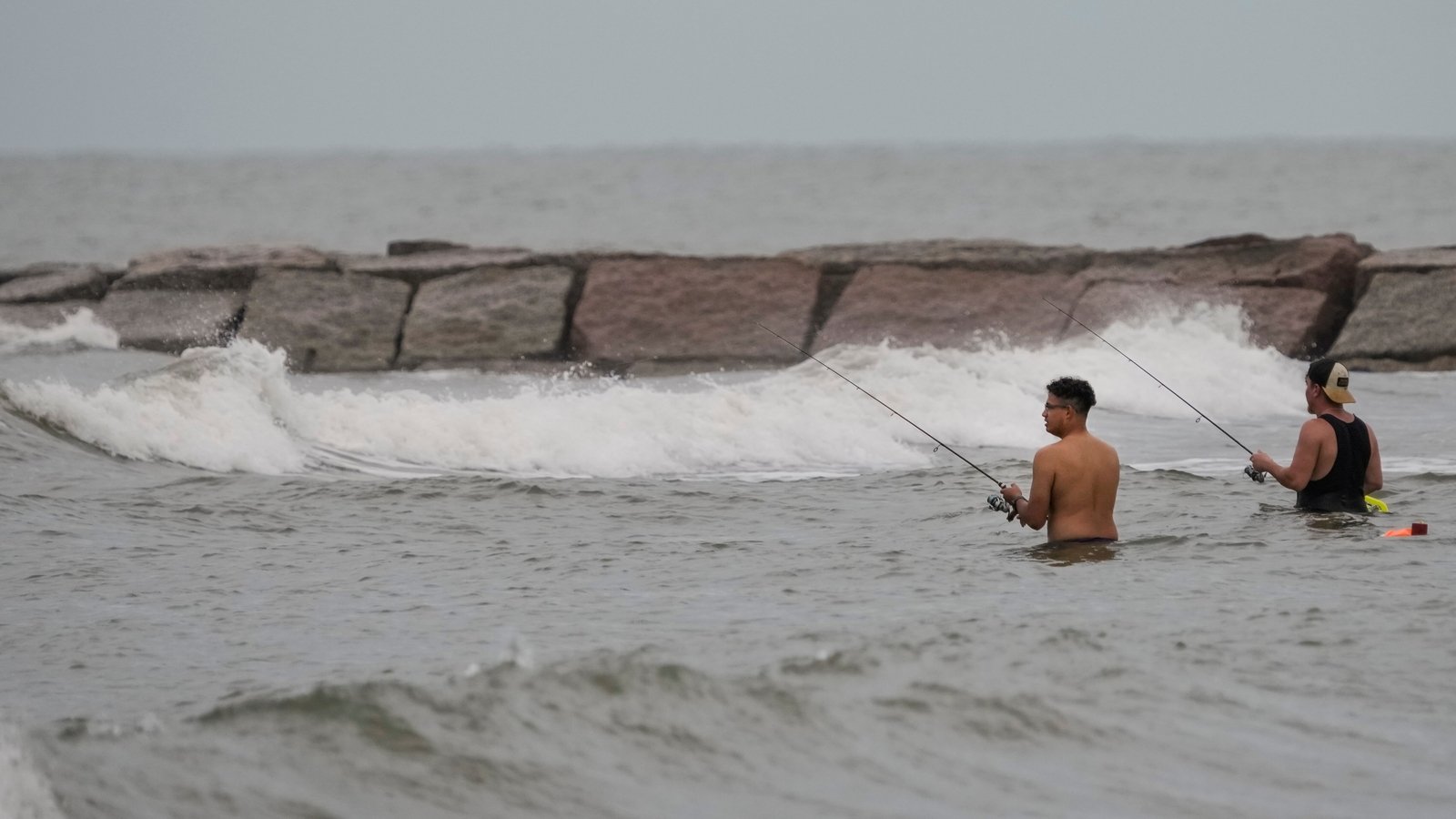 The National Hurricane Center reported that Edouard was located about 15 miles (25 kilometers) south-southeast of Port Arthur, Texas. (Brett Coomer/Houston Chronicle v)
