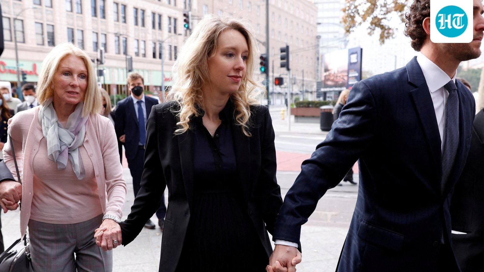 Theranos founder Elizabeth Holmes arrives with her family and partner Billy Evans to be sentenced on her convictions for defrauding investors in the blood testing startup at the federal courthouse in San Jose, California, U.S., November 18, 2022. (REUTERS)