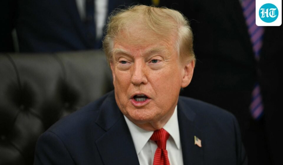 US President Trump signs H-1B order targeting employers over layoffs of US workers. (AFP)