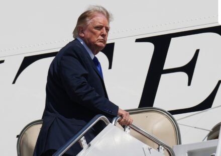 President Donald Trump is seen boarding the Qatar-gifted Air Force One after an emergency inflatable slide deployed before he arrived at Joint Base Andrews. (AP Photo/Jacquelyn Martin)