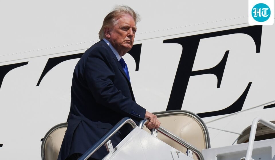 President Donald Trump is seen boarding the Qatar-gifted Air Force One after an emergency inflatable slide deployed before he arrived at Joint Base Andrews. (AP Photo/Jacquelyn Martin)