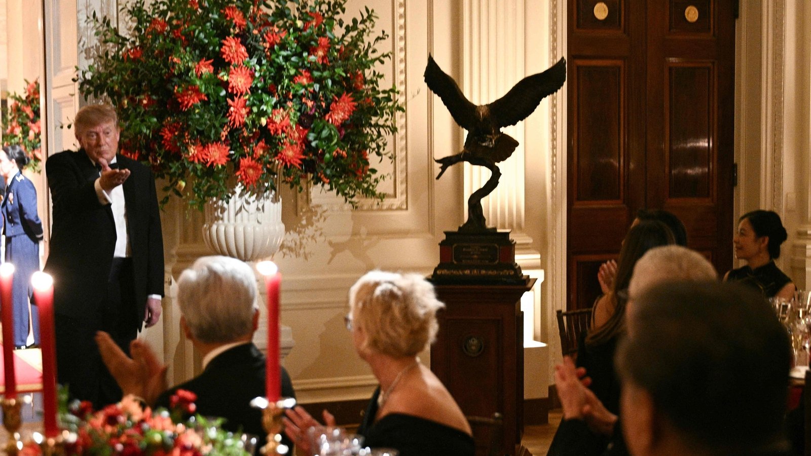 During a Washington state dinner, Trump presented Xi with a bald eagle sculpture, reflecting America's spirit. The event featured a unique menu merging American and Chinese influences. (AFP)
