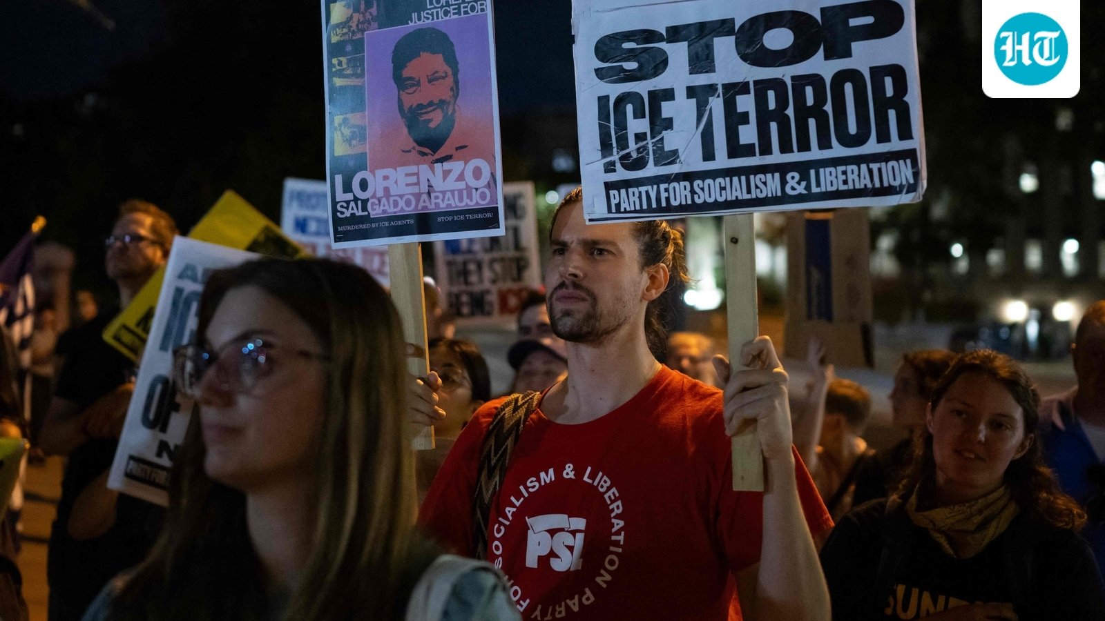 People protest outside the Texas State Capitol in Austin, Texas, on September 21, 2026, a day after a Venezuelan national was shot and wounded during a US Immigration and Customs Enforcement (ICE) operation. (Photo by RONALDO SCHEMIDT / AFP) (AFP)