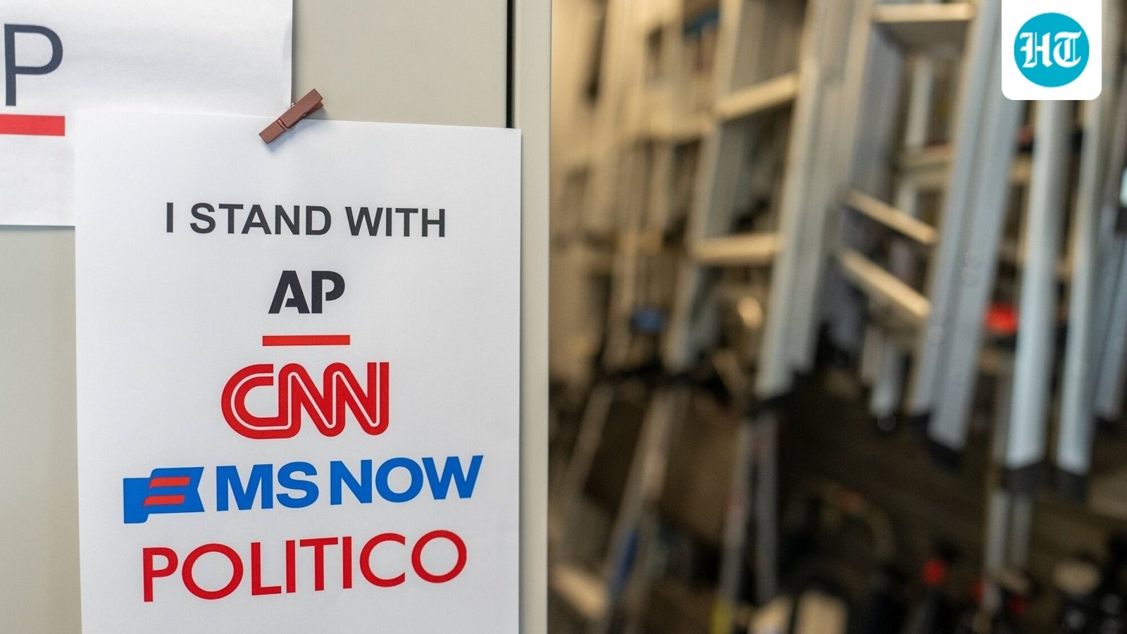 "I Stand With AP, CNN, MS NOW, and Politico" signage near the James S. Brady Press Briefing Room of the White House in Washington, DC, US. (Bloomberg)
