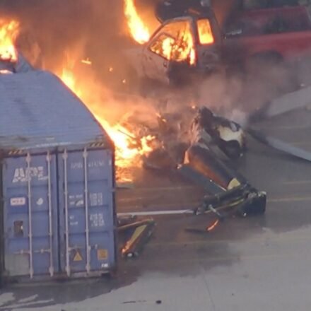 An aerial view shows the burning wreckage of an NBC News helicopter that crashed while covering a report of a deadly Metro bus collision, resulting in multiple casualties, in Chatsworth, Los Angeles (REUTERS)