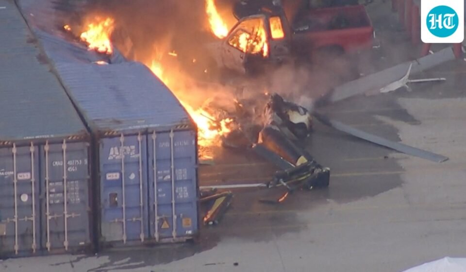An aerial view shows the burning wreckage of an NBC News helicopter that crashed while covering a report of a deadly Metro bus collision, resulting in multiple casualties, in Chatsworth, Los Angeles (REUTERS)