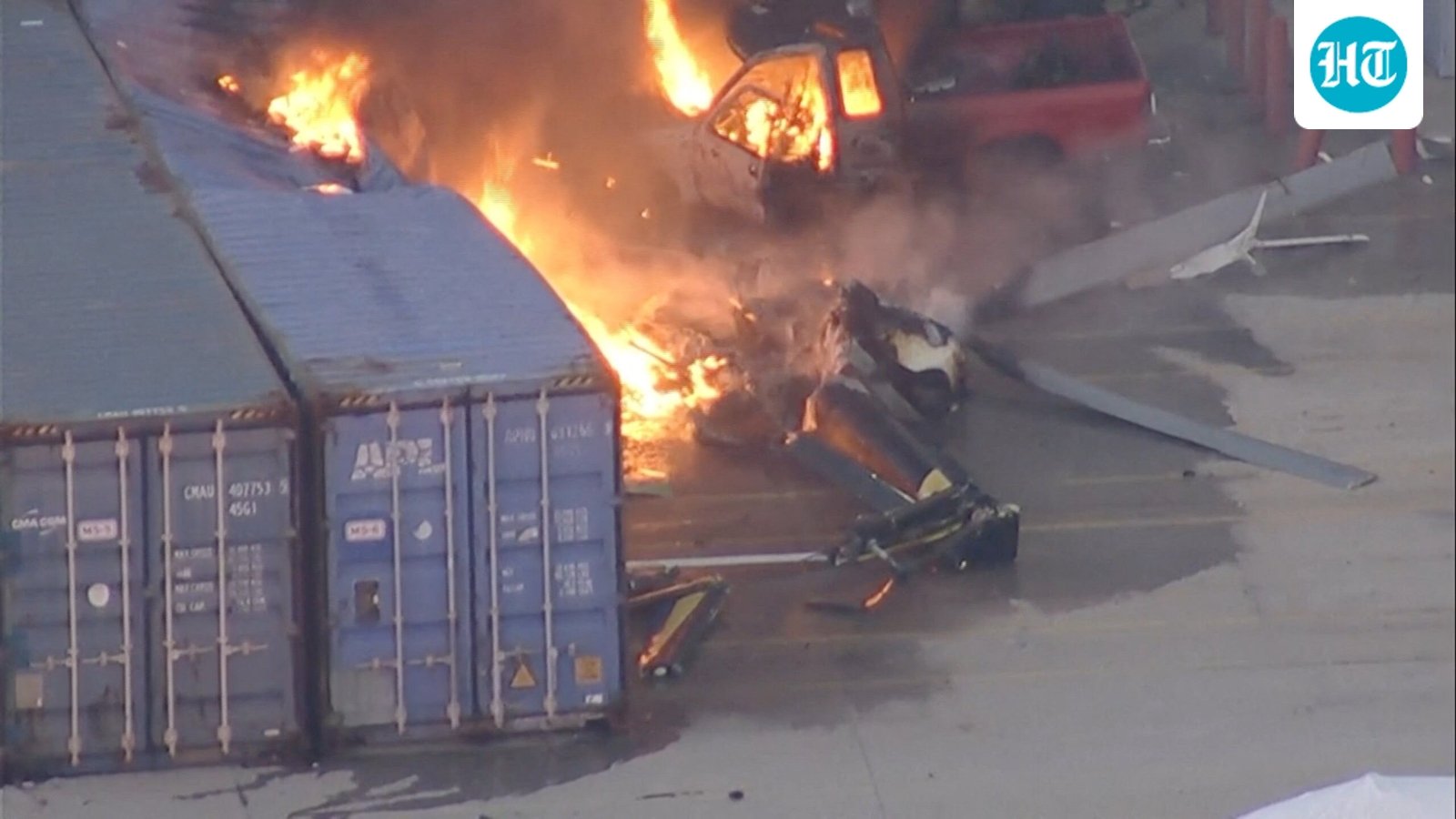 An aerial view shows the burning wreckage of an NBC News helicopter that crashed while covering a report of a deadly Metro bus collision, resulting in multiple casualties, in Chatsworth, Los Angeles (REUTERS)