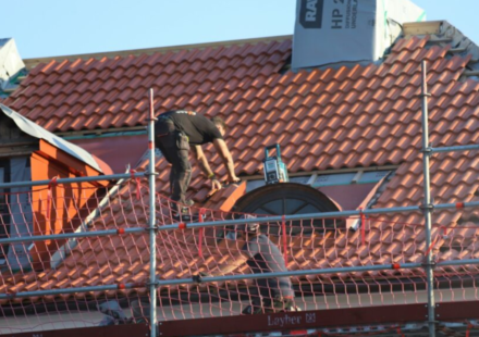 In 1997, Texas mixed discarded roofing shingles into two 1,000-foot Highway 31 test sections; years later, officials said their performance was comparable to conventional asphalt
