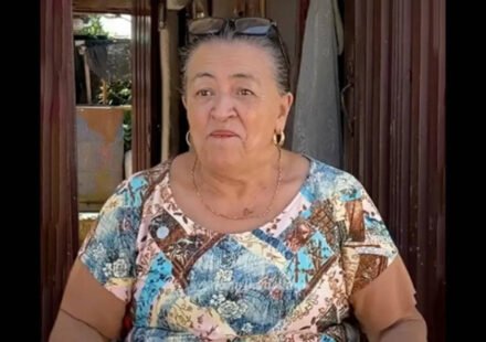 67-year-old Colombian woman makes money selling neighbourhood gossip; she carries a notebook, collects evidence, also takes payment to keep her mouth shut