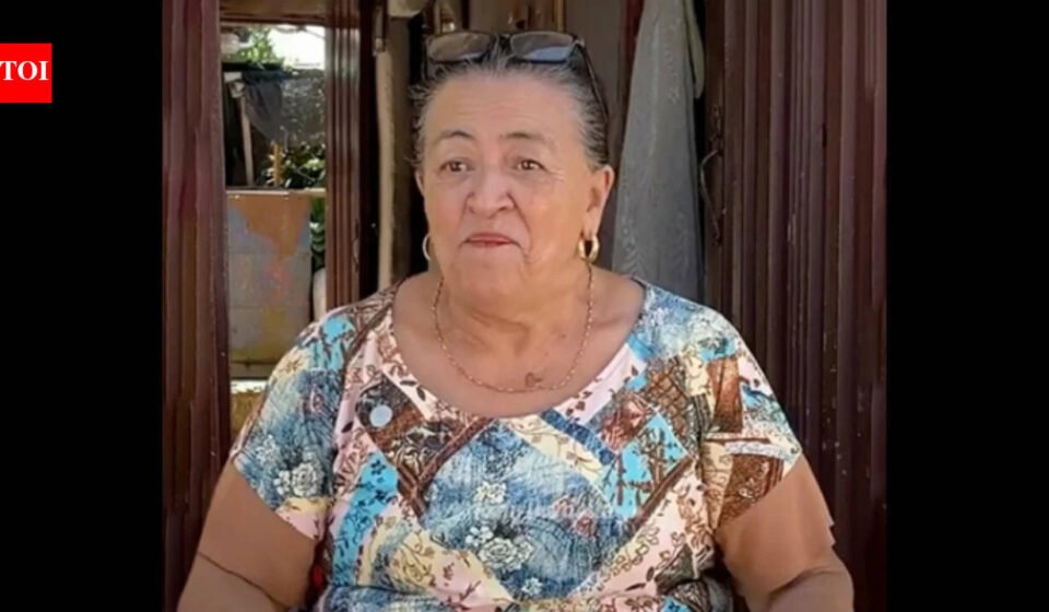 67-year-old Colombian woman makes money selling neighbourhood gossip; she carries a notebook, collects evidence, also takes payment to keep her mouth shut