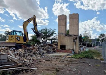 Cheyenne's Twin Chimneys motor court stood for almost 90 years; this week its landmark chimneys fell in about 30 seconds to make way for a drive-thru coffee shop