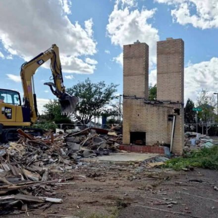 Cheyenne's Twin Chimneys motor court stood for almost 90 years; this week its landmark chimneys fell in about 30 seconds to make way for a drive-thru coffee shop