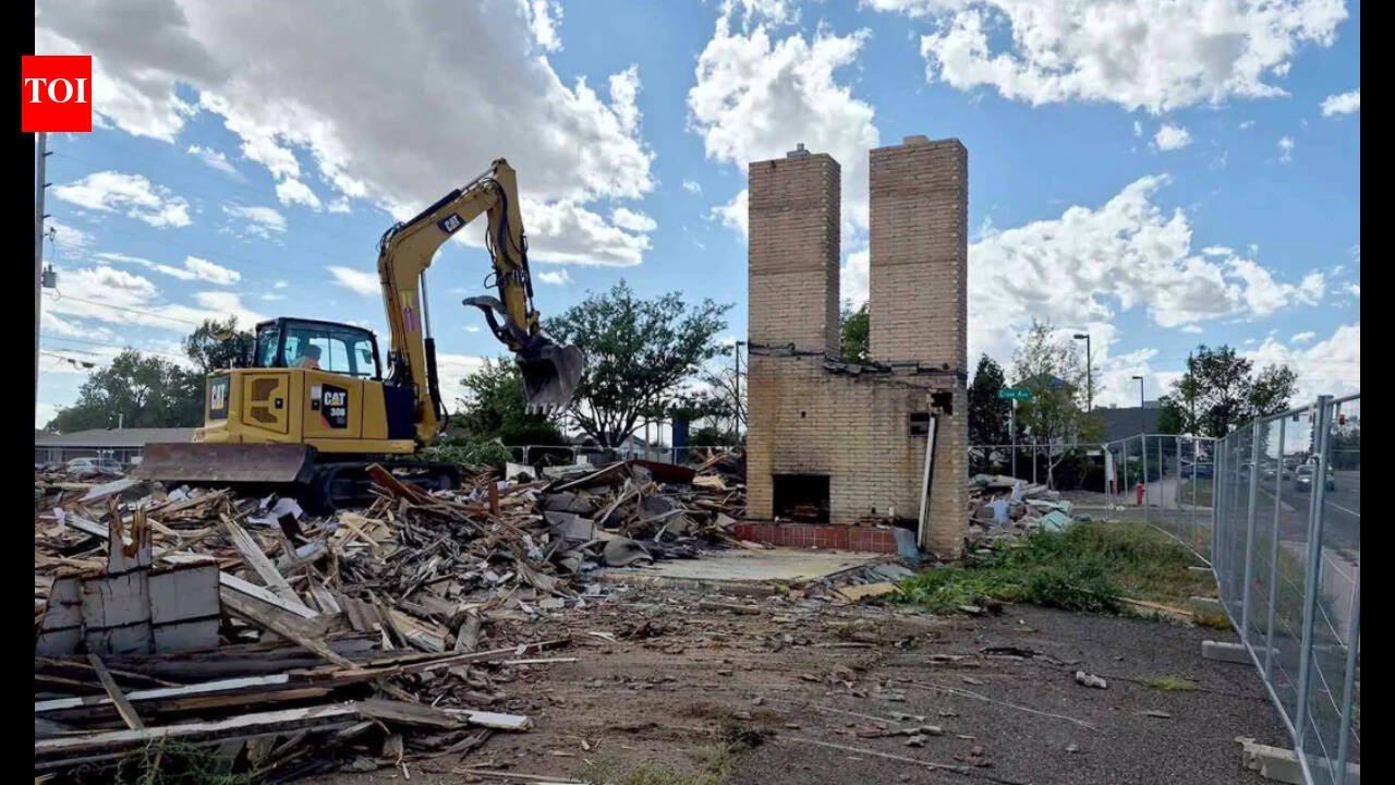 Cheyenne's Twin Chimneys motor court stood for almost 90 years; this week its landmark chimneys fell in about 30 seconds to make way for a drive-thru coffee shop