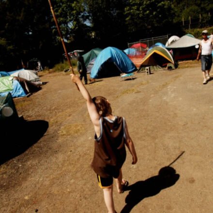 10-year-old Seattle boy lived in a tent while his mother battled fentanyl addiction; after an 11-month rescue effort, he entered school for the first time and said, 'I want to go back'