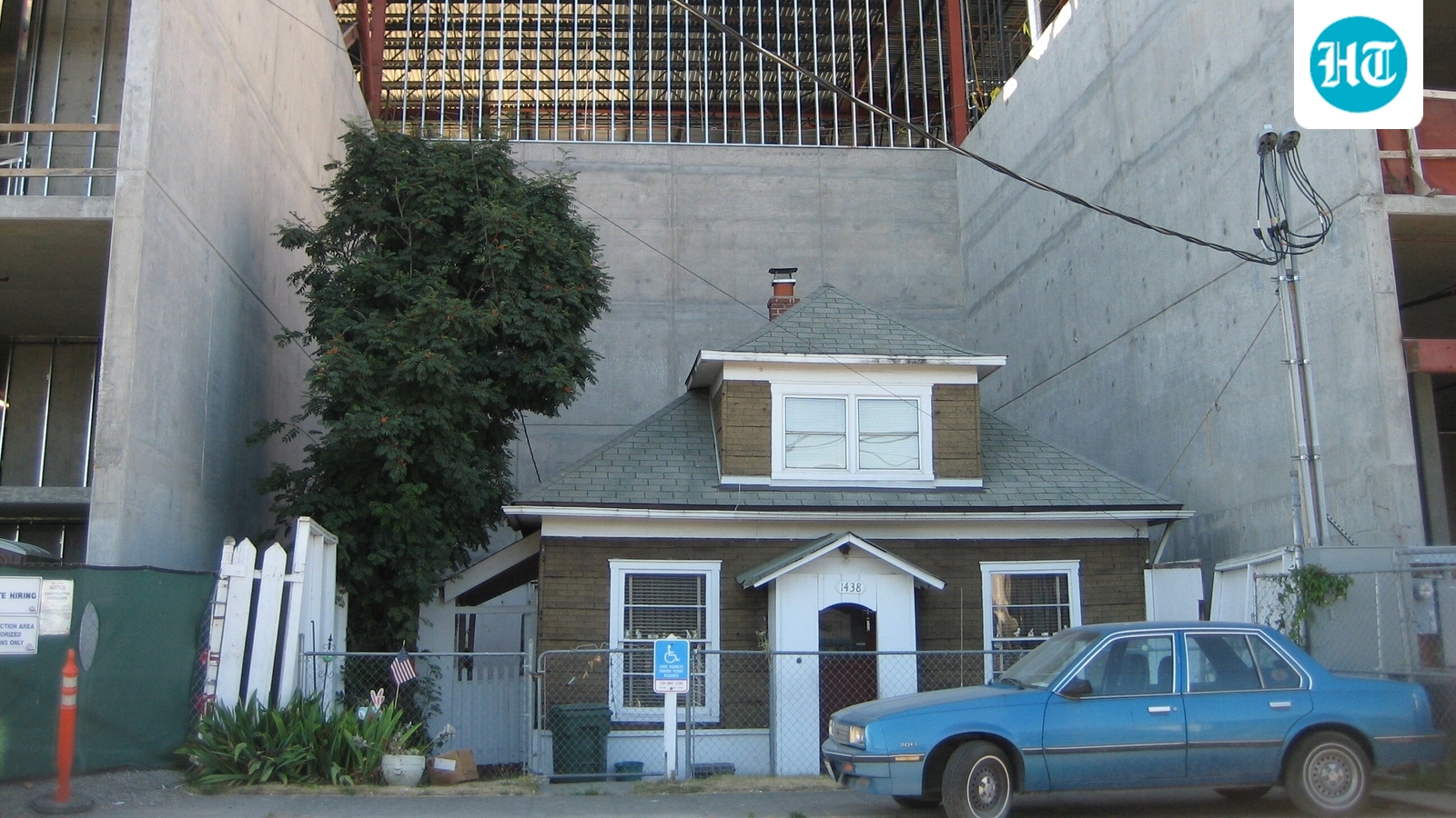 Edith Macefield refused offers of up to $1 million to leave her Seattle home, which developers built around for a shopping center. She stayed until her death in 2008, supported by neighbors and a construction superintendent who became her friend. (Wikimedia Commons)