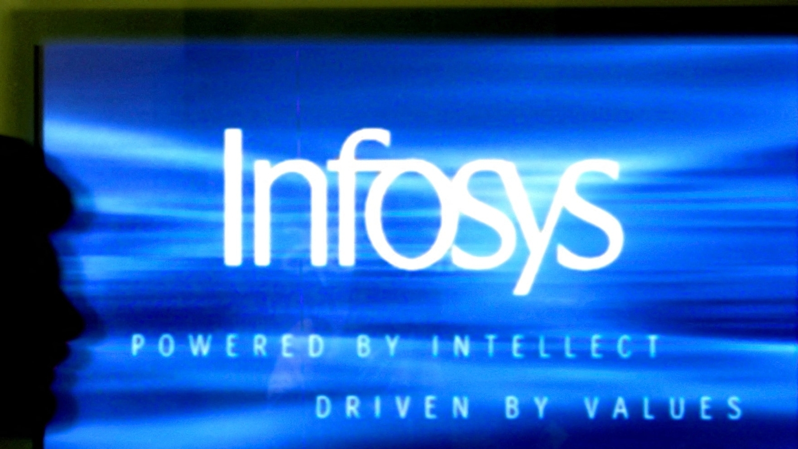In a financial filing, Infosys disclosed discussions with the DOJ about an investigation into immigration paperwork for certain H-1B visa holders.