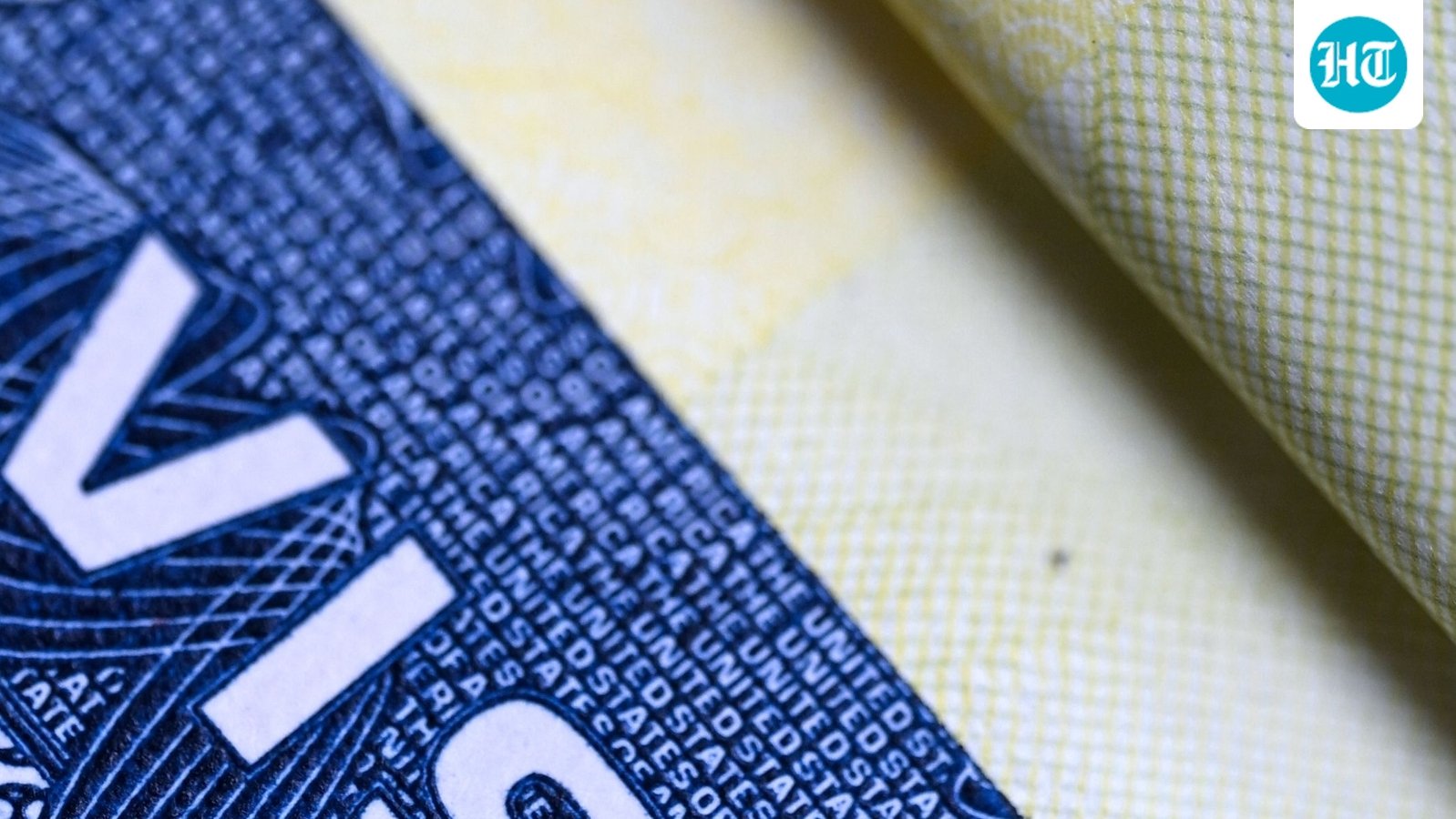 This illustration picture shows a US visa in a passport in Mexico City on August 25, 2026. The US government plans to revoke the visas of foreigners who came to the country for tourism or business but sought to stay longer by applying for asylum, the State Department said on August 25, 2026. (Photo by Yuri CORTEZ / AFP) (AFP)
