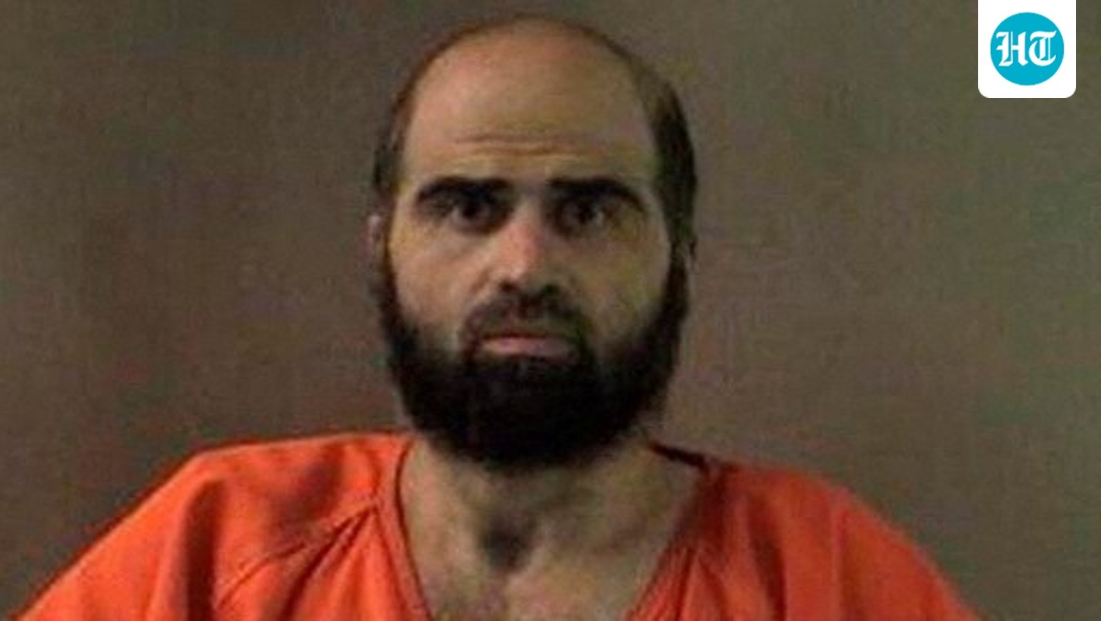 Nidal Hasan, charged with killing 13 people and wounding 31 in a November 2009 shooting spree at Fort Hood, is pictured in an undated handout photo obtained by Reuters on June 29. (Reuters)
