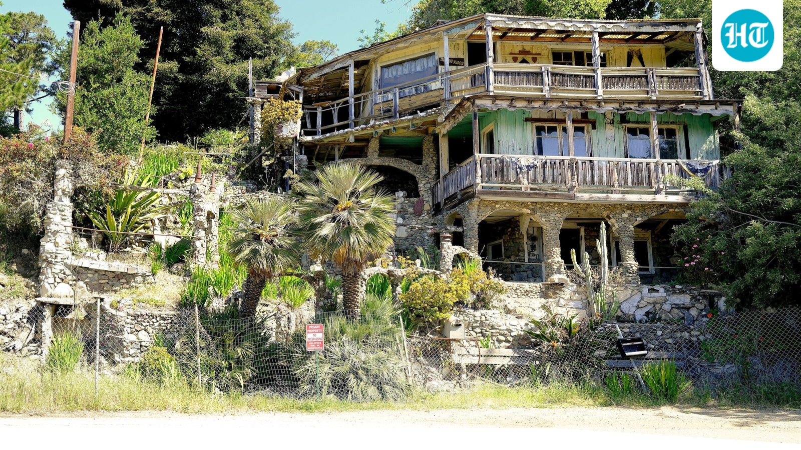 Art Beal built Nitt Witt Ridge with materials others discarded, shaping a steep California hillside into nine levels of terraces and structures. He lived there until 1989. (Wikimedia Commons)