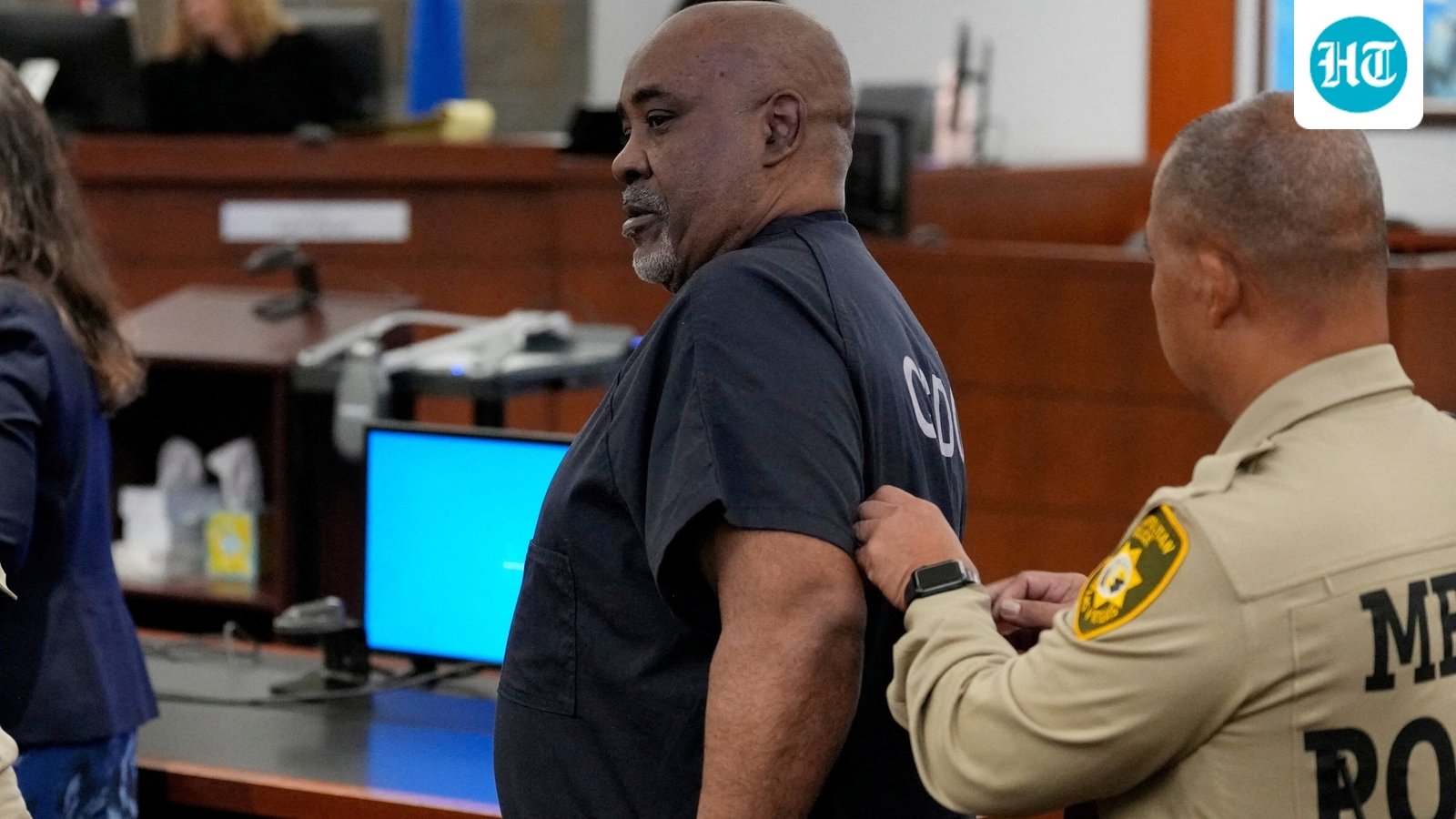 Duane Davis is escorted by police from a sentencing hearing after his murder conviction in the death of rapper Tupac Shakur on Tuesday, Oct. 13, 2026, in Las Vegas, Nevada, US.     John Locher/Pool via REUTERS     TPX IMAGES OF THE DAY (via REUTERS)