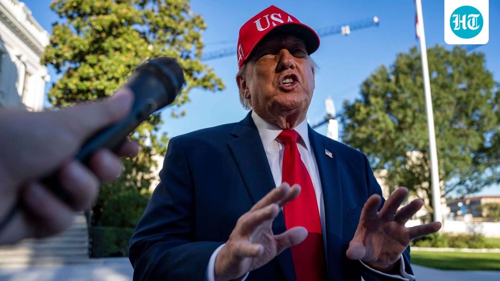 US President Donald Trump speaks to members of the media on the South Lawn of the White House after arriving on Marine One in Washington, DC, US. (Bloomberg)