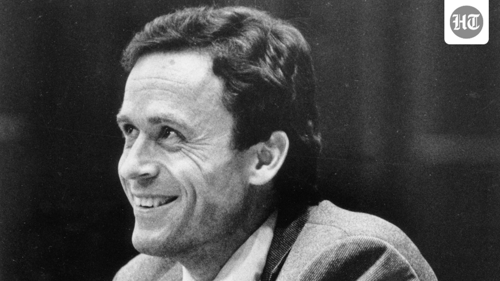 Ted Bundy smiles during the second day of jury selection for his murder trial in a Dade County courtroom in Miami, June 27, 1979. (/POOL via AP)