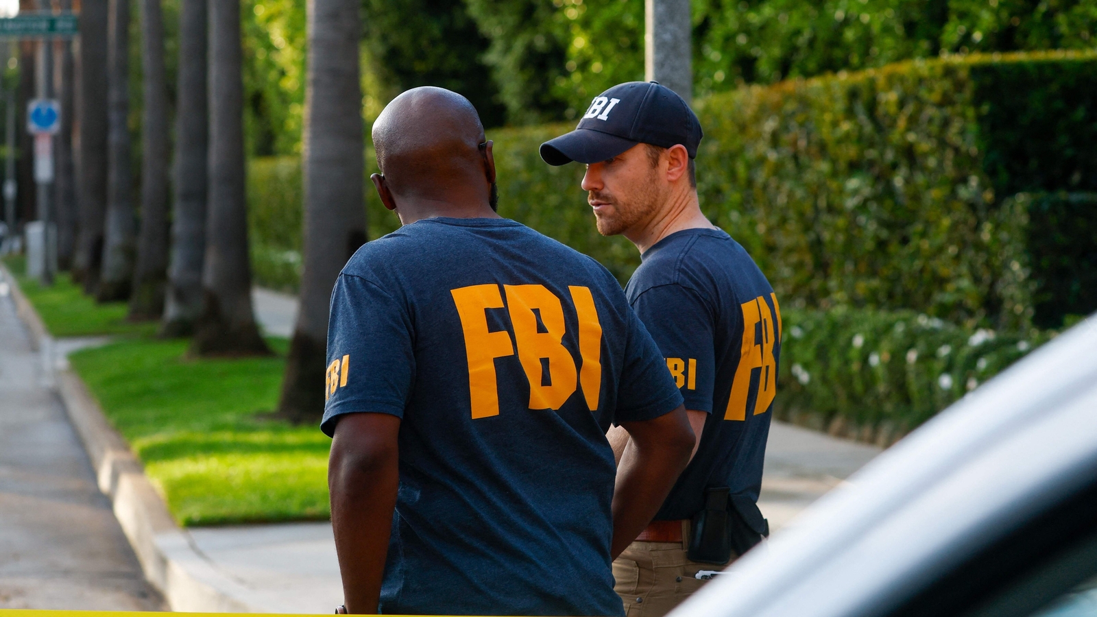 Members of the FBI are seen outside a home tied in an investigation in to U.S. Rep. Eric Swalwell (D-CA) on October 27, 2026 in Beverly Hills, California. (Getty Images via AFP)