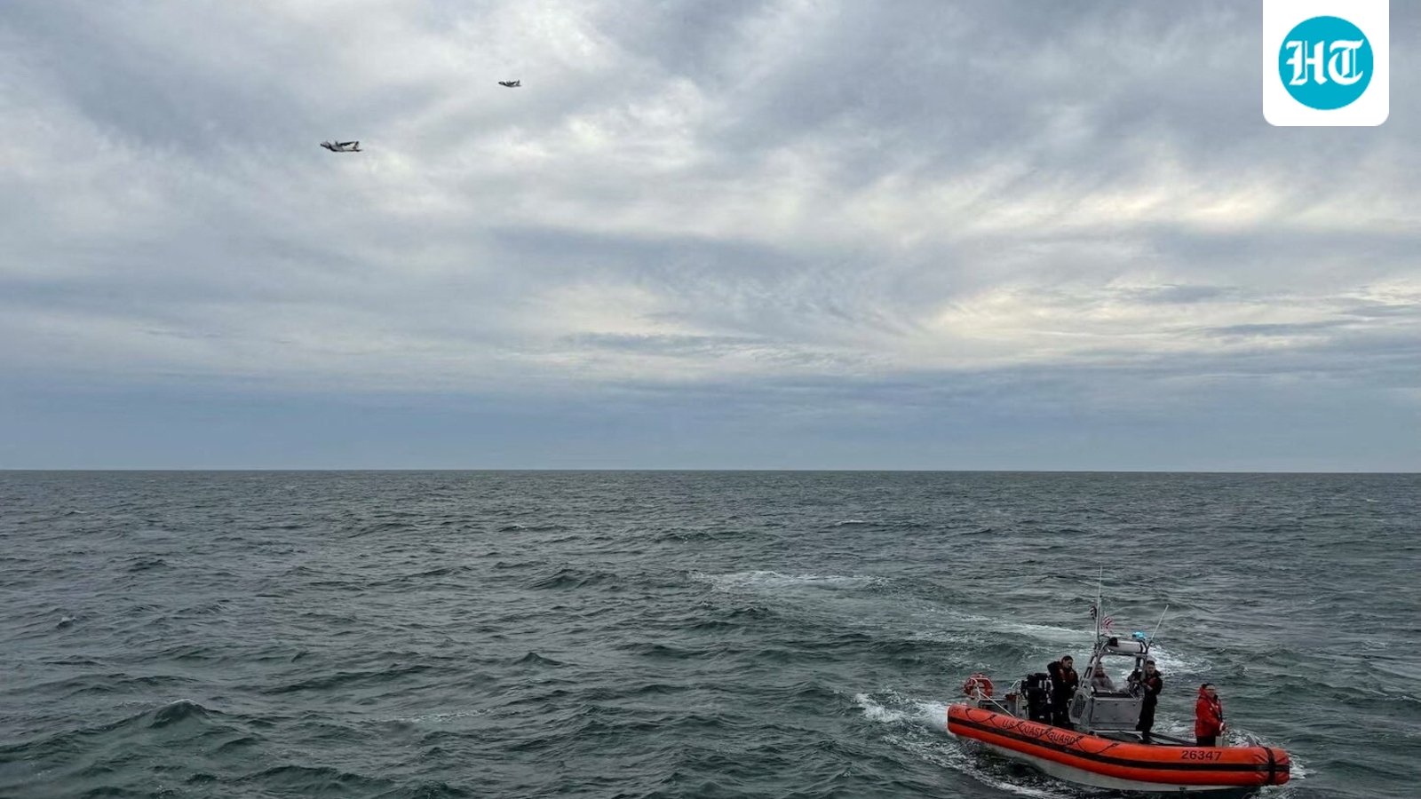 US Coast Guard members search for people after it found debris from a medical transport aircraft off the shore of Massachusetts' Nantucket island on October 3. (via REUTERS)