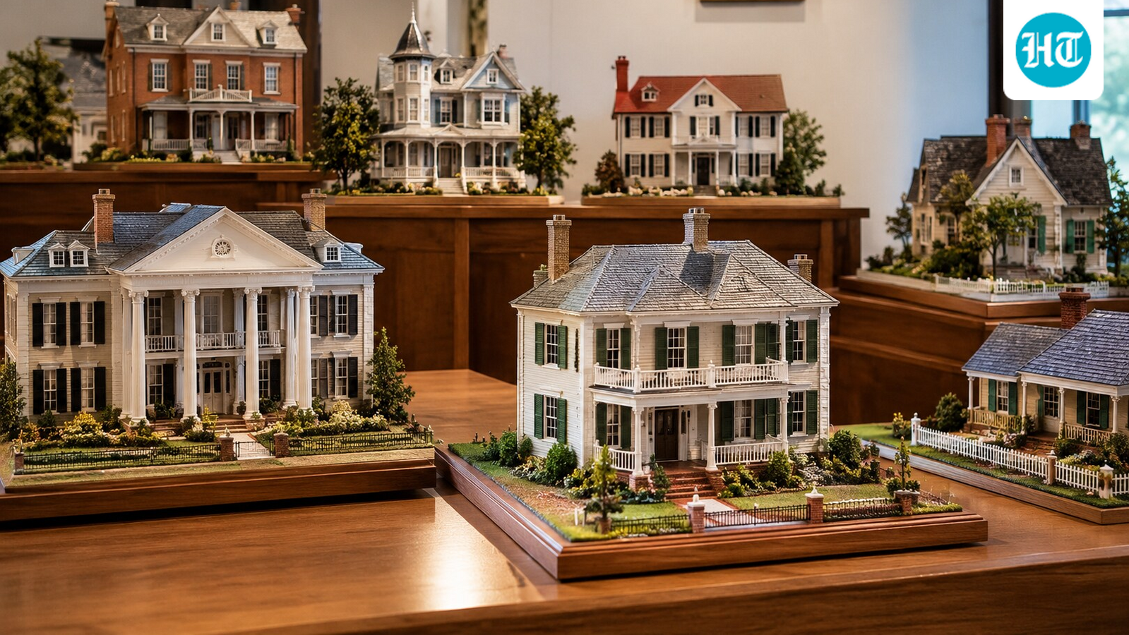 Representative image showing a collection of handcrafted miniature houses displayed in a museum-style gallery. (AI-generate/ ChatGPT)