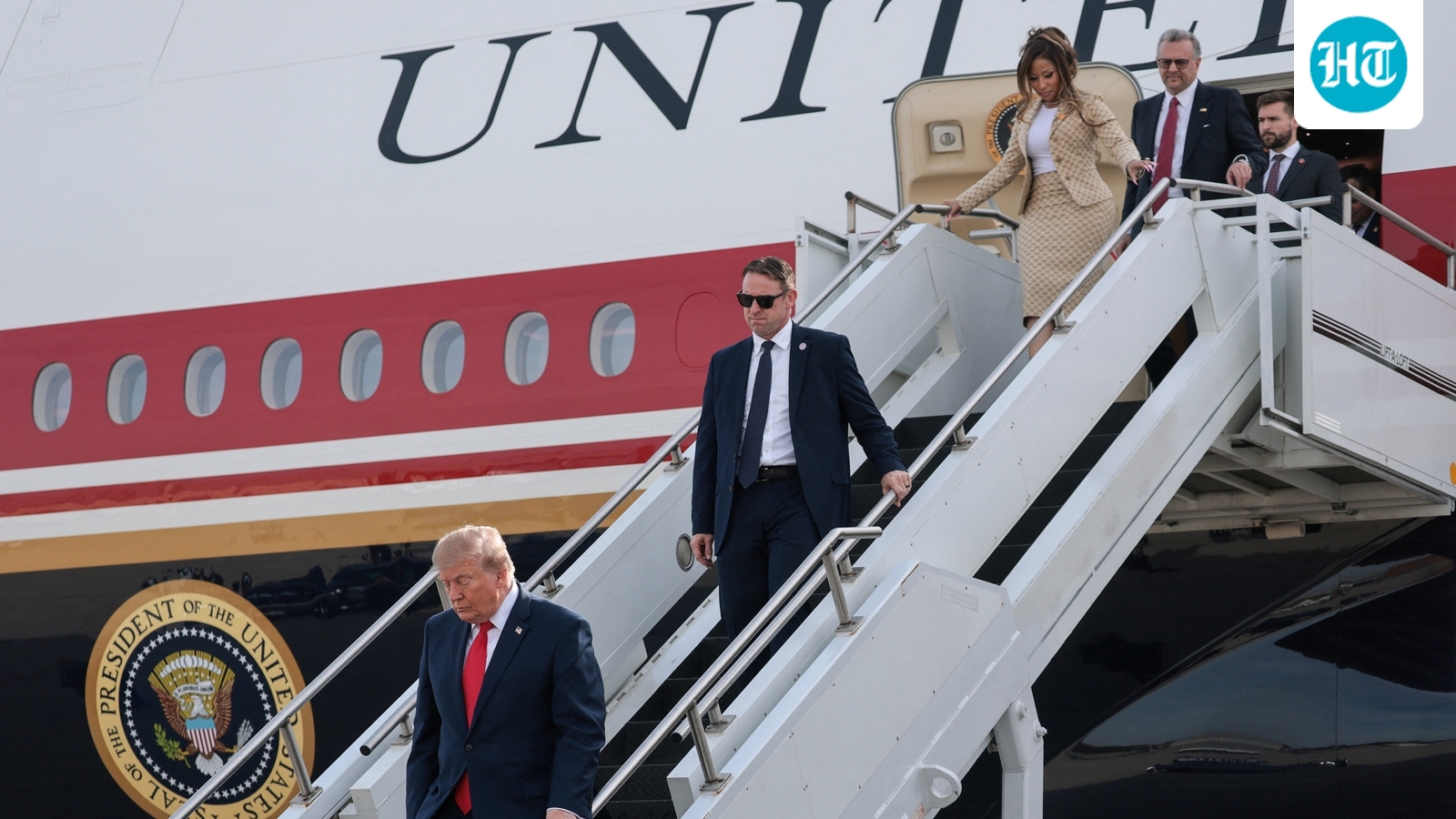 US President Donald Trump and Nicki Minaj disembark Air Force One at Selfridge Air National Guard Base, Michigan, US, October 25. (REUTERS)