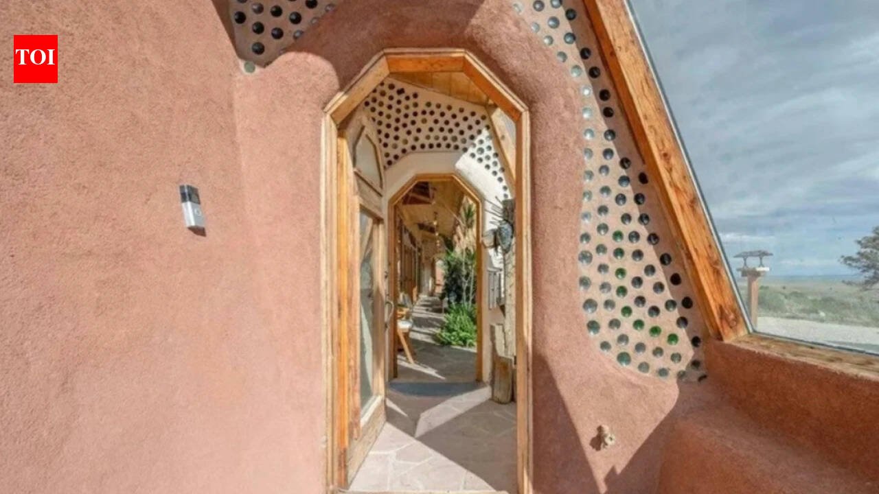 In 2011, a Wyoming couple built a 1,500-sq-ft off-grid home from 1,343 tyres on 55 acres, adding a 66-foot greenhouse, solar panels and rainwater systems; 15 years later, the unusual Earthship is listed for $625,000