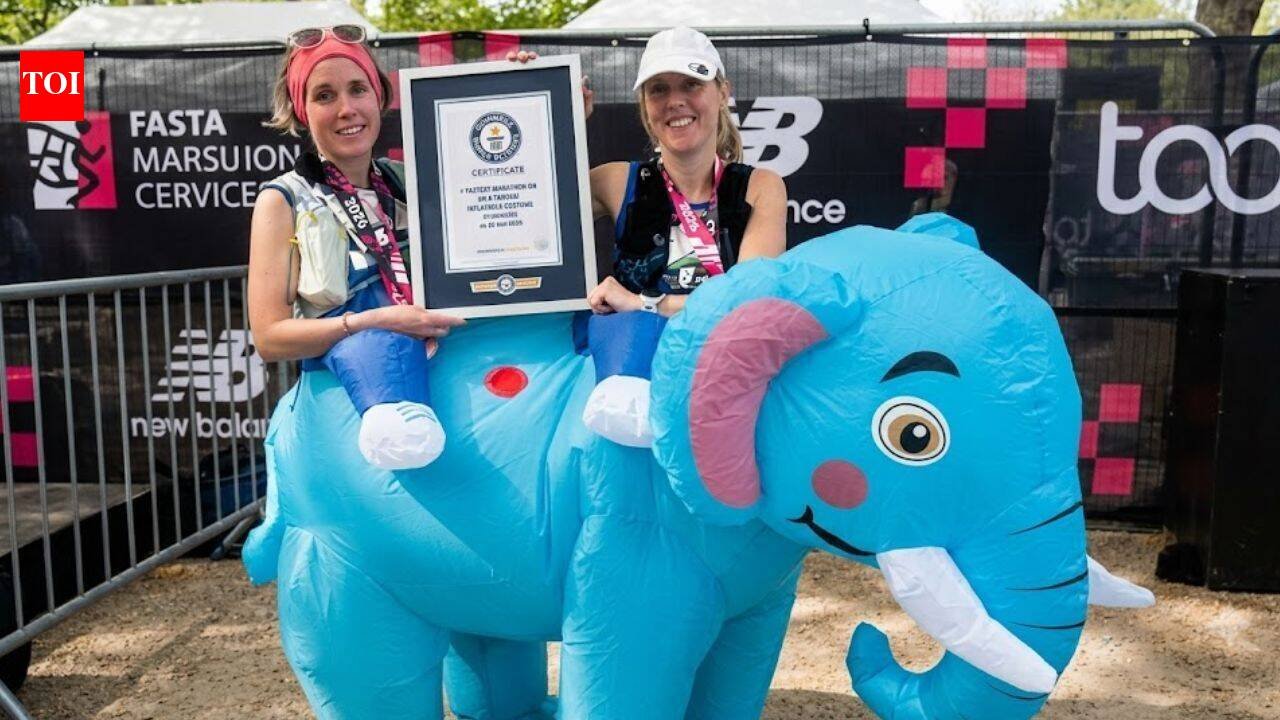 Two runners completed the London Marathon inside one giant inflatable elephant in 4:15:40; they set a world record while raising money for type 1 diabetes