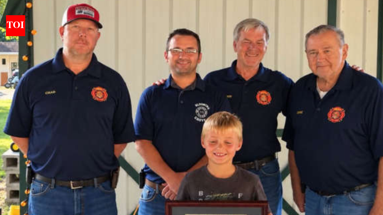 An 8-year-old Indiana boy spotted a smoking camper trailer and alerted people nearby before it caught fire; he was honoured with Department Patch and Certificate of Recognition for preventing a larger emergency
