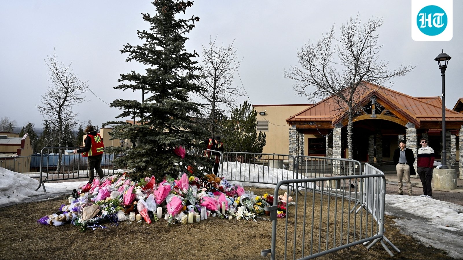 Workers install a fence around a makeshift memorial for the victims two days after a deadly mass shooting took place at a school in the town of Tumbler Ridge, British Columbia, Canada. REUTERS/Jennifer Gauthier/File Photo (REUTERS)